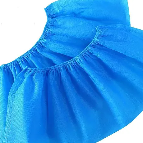 Cobertes de sabates mèdiques impermeables d'un sol ús no teixit